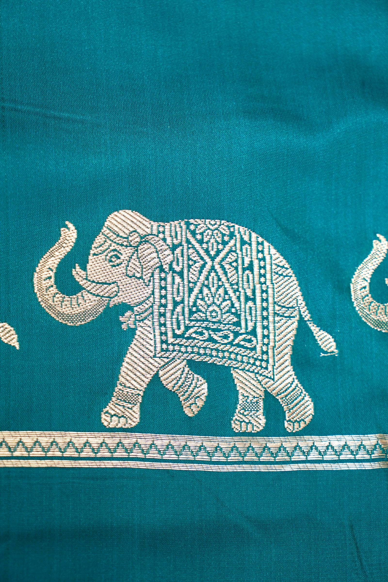 TEAL GREEN BANARASI MASHRU KATAN SILK SAREE (ELEPHANT BORDER)