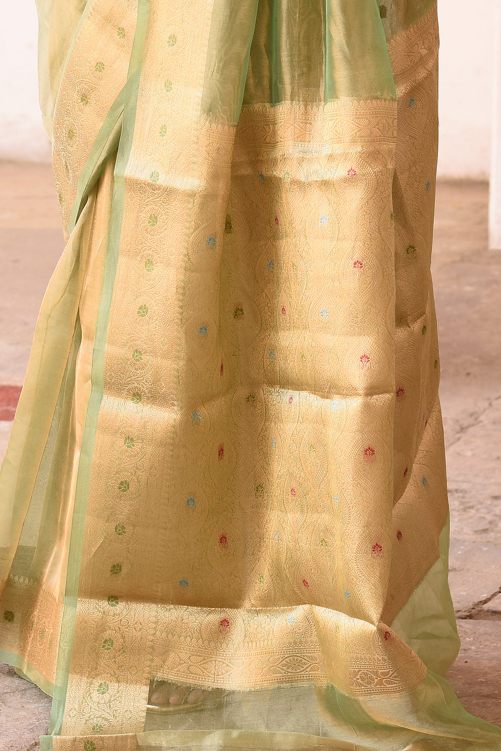 Light Green Plain Tissue Silk Saree with Elegant Traditional Zari Border